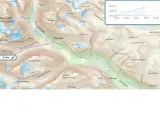 Karta över Abisko med markerad rutt för en dagstur på 8,7 km. Vackra fjäll och glaciärer syns.