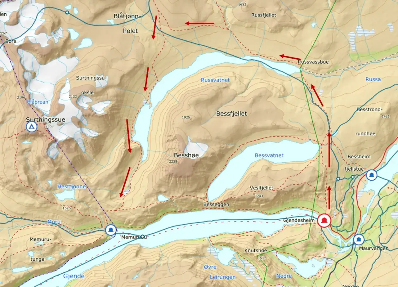 Karta över Jotunheimen vandringsleder visar leder runt Bessvatnet och Surtningssue, med markerade toppar och sjöar.